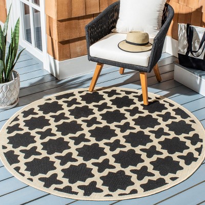 Courtyard Reversible 47" Round Black & Beige Synthetic Area Rug