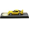 Mazda RX-7 (FD3S) RHD Yellow w/Keisuke Takahashi Figure "Initial D" (1995-2013) Manga 1/64 Diecast Model Car by Hobby Japan - 2 of 3