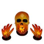 Northlight 8.5" Lighted Orange Skull and Hands Outdoor Halloween Decoration - 4ft Black Wire