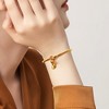 Free bird Cross Birthstone Bracelet | Dainty 14K Gold Plated Cross Charm Bracelet | Stretchable Elastic Gold Beaded Bracelet - 4 of 4