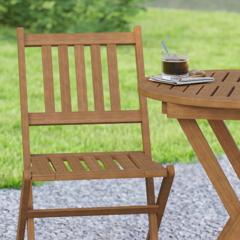 Emma and Oliver All-Weather Three Piece Solid Acacia Wood Patio Bistro Set with Two Folding Chairs and Table, 6 of 14