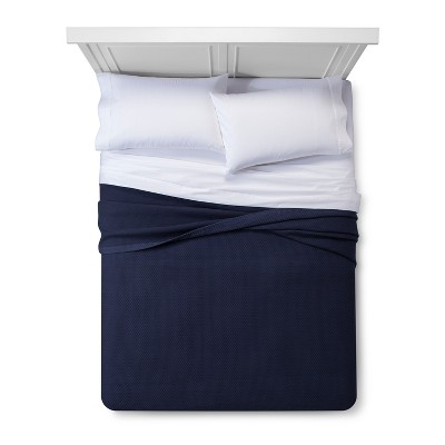 navy and white coverlet