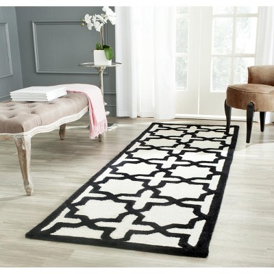 Hand-Tufted Black and Ivory Wool Area Rug, 2'6" x 4'