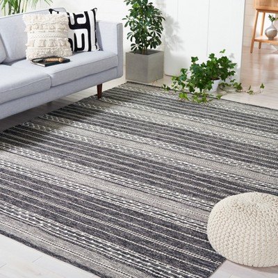 Handmade Black Stripe Wool 6' x 9' Easy Care Area Rug