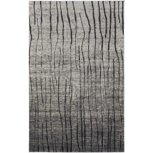 Gray and Black Abstract Power Loom Area Rug - 1 of 3