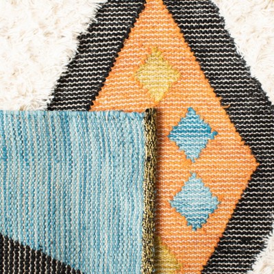Kenya 4' x 6' Hand-Knotted Wool Rug in Black and Ivory