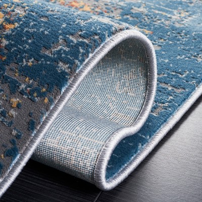 Ivory Abstract Braided 24" Synthetic Reversible Rug
