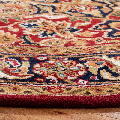 Elegant Red Oval Hand-Tufted Wool Area Rug - 7'6" x 9'6"