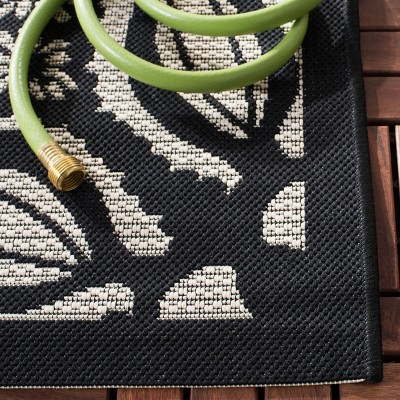 Beige and Black Synthetic Round Medallion Area Rug