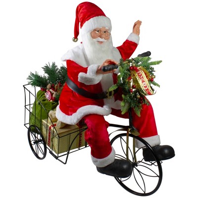 Northlight 32" Pre-Lit LED Animated and Musical Santa Claus Riding a Tricycle Christmas Figurine