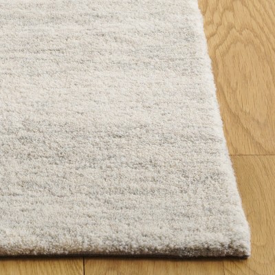 Ebony EBN221 Handmade Tufted Rug - Safavieh
