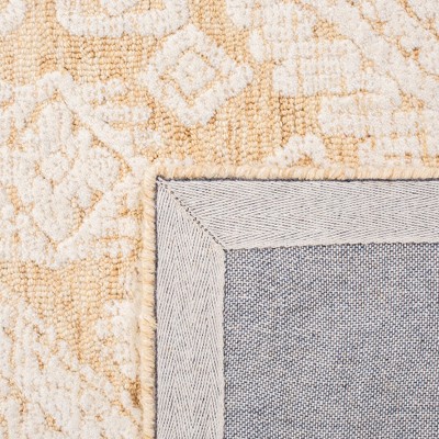 Ivory and Gold Hand-Tufted Wool 6' x 9' Area Rug