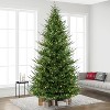 Puleo 12' Pre-Lit Artificial Hillside Spruce Tree - 2 of 4