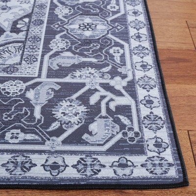 Tucson Black and Beige Synthetic 5' x 8' Washable Area Rug