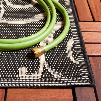 Large Black and Sand Rectangular Synthetic Indoor/Outdoor Area Rug