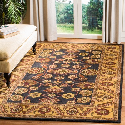 Elegant Jaipur Heritage Black and Gold 5' x 8' Wool Area Rug