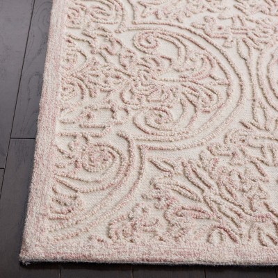 Ivory and Pink Hand Tufted Wool 6' x 9' Area Rug