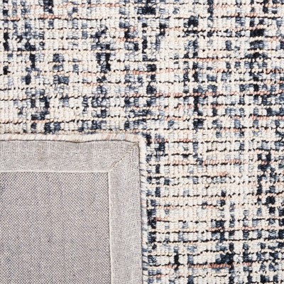 Handmade Black and Beige Abstract Wool Area Rug, 4' x 6'