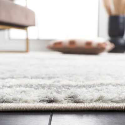 Ivory Elegance 63" Hand-Knotted Boho-Chic Synthetic Area Rug
