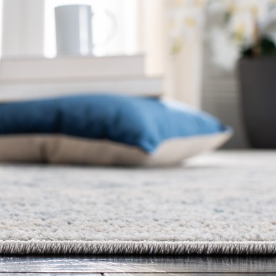 Oregon Light Blue and Ivory Synthetic Medallion Area Rug 6' x 9'