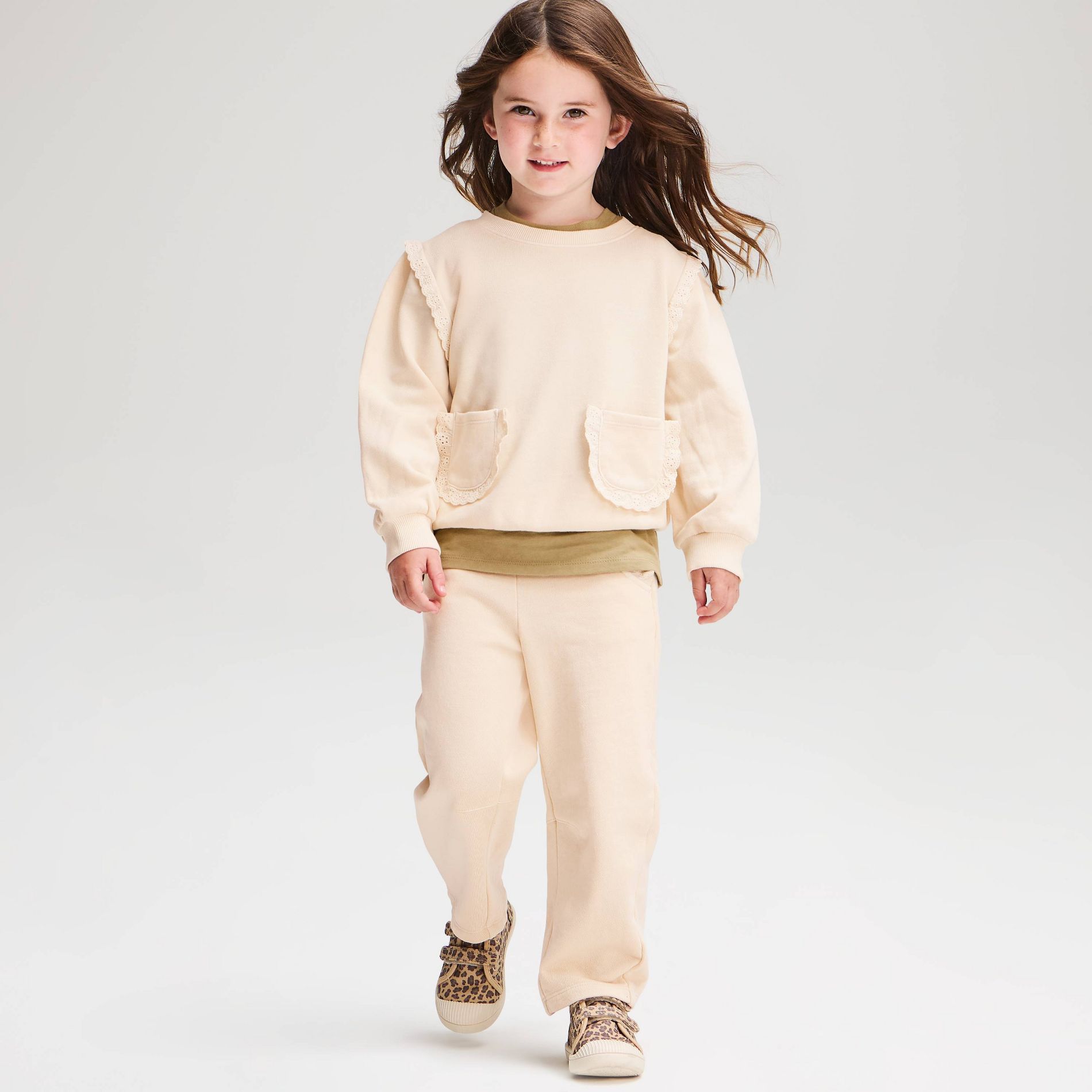 Toddler Girls' Solid French Terry Ruffle Pocket Sweatpants - Cat & Jack™ Cream 4T