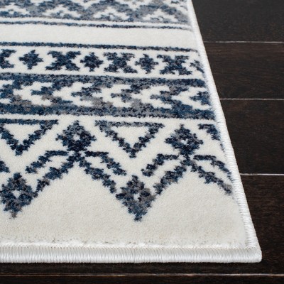 Ivory Rectangular 9' x 12' Stain-Resistant Synthetic Area Rug