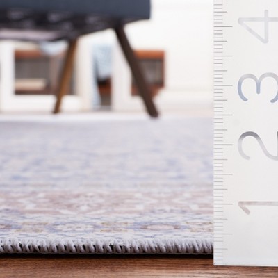 Blue and Rust 6' x 6' Square Washable Synthetic Area Rug