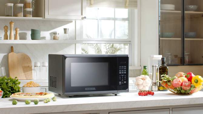 BLACK+DECKER 1.1 cu ft 1000W Microwave Oven - Stainless Steel Black, 2 of 8, play video