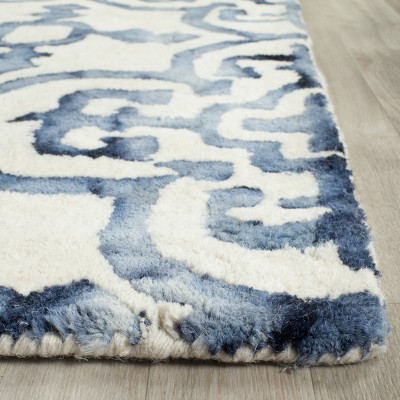 Ivory and Navy Hand-Tufted Wool Round Accent Rug - 2' x 3'