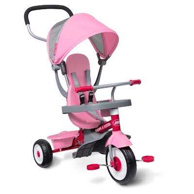 pink trike with parent handle