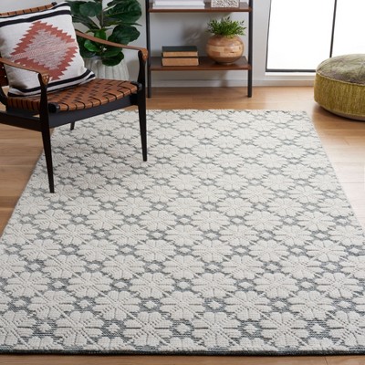 Handmade Ivory and Green Wool 9' x 12' Area Rug