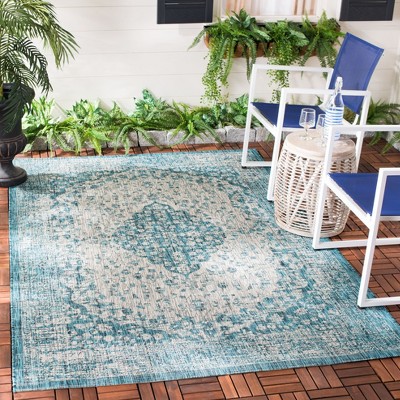 Teal and Cream Rectangular Reversible Synthetic Area Rug