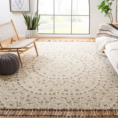 Ivory Handmade Tufted Wool 8' x 10' Reversible Area Rug