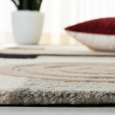Rodeo Drive 5' x 8' Beige and Black Wool Area Rug