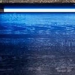 tempered glass door with vintage wood panel