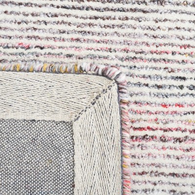 Handmade Red and Ivory Floral Wool Area Rug