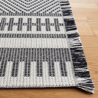 Ivory and Black Geometric Flat Woven Area Rug