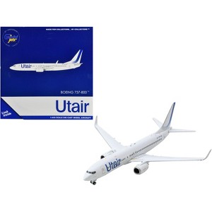 Boeing 737-800 Commercial Aircraft "Utair" White with Blue Tail Stripes 1/400 Diecast Model Airplane by GeminiJets - 1 of 3