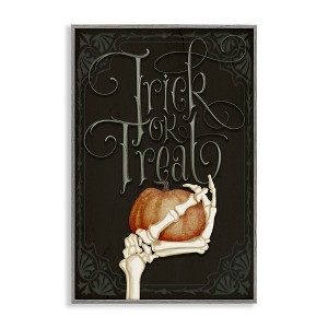 Stupell Industries Trick Or Treat Skeleton Hand Framed Giclee Art, Gray, 12" x 18" - 1 of 4
