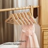 Kids Wooden Hangers 20 Pack, Solid Wood Baby Hangers with Pants Bar, Shoulder Notches, and Swivel Hooks, 12.6 x 7.5 Inches - 2 of 4