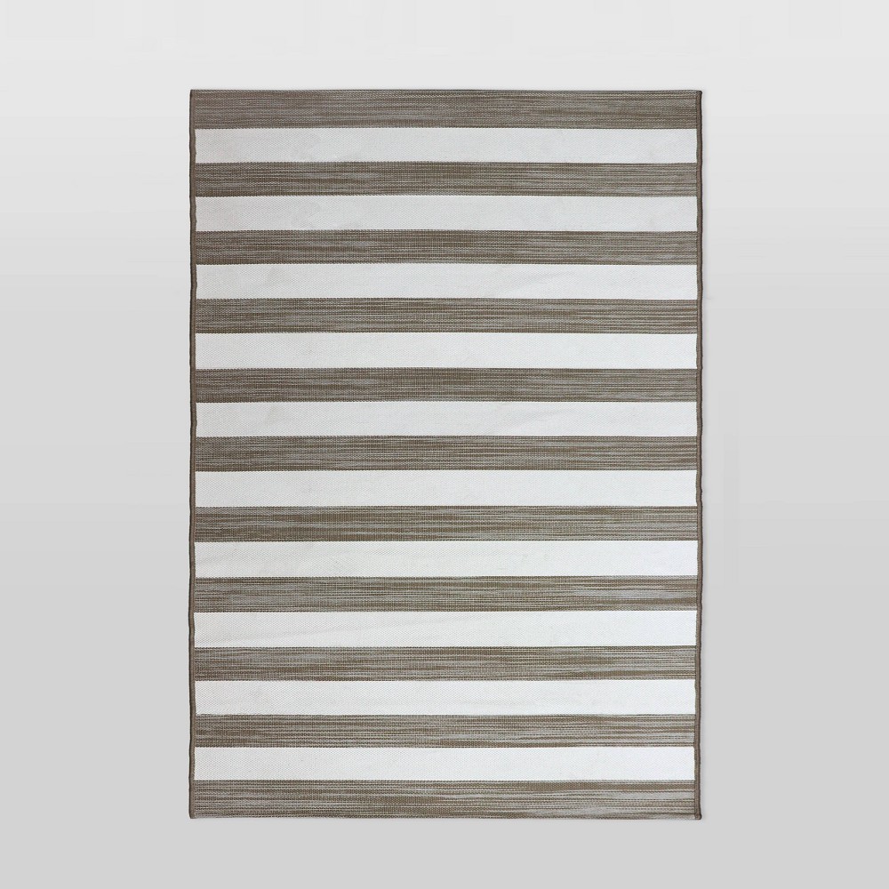 6'x9' Outdoor Rug Worn Stripe Tan - Threshold™
