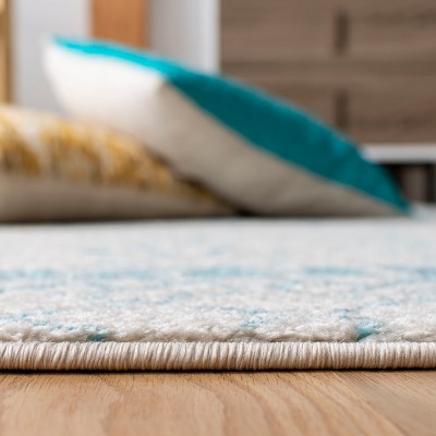 Ivory and Turquoise Hand-knotted Wool 6' x 9' Area Rug