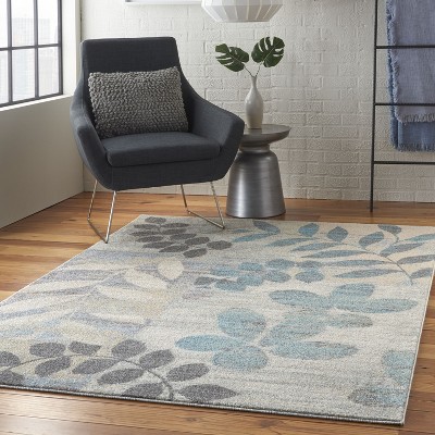 Ivory and Light Blue Floral Synthetic 5' x 7' Area Rug