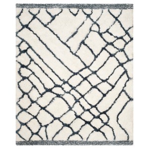 Ivory/Blue Abstract Tufted Area Rug - (8