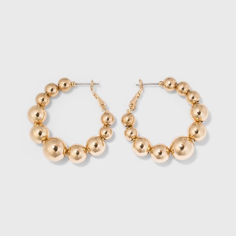 Textured Metal Small Hoop Earrings - A New Day™ Gold