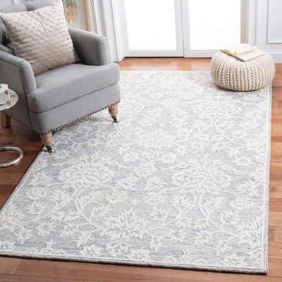 Blue and Ivory Hand-Tufted Wool 4' x 6' Area Rug