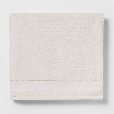 cream colored bath towels