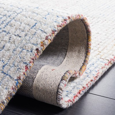 Handmade Ivory and Blue Wool Blend Abstract Area Rug, 5' x 8'