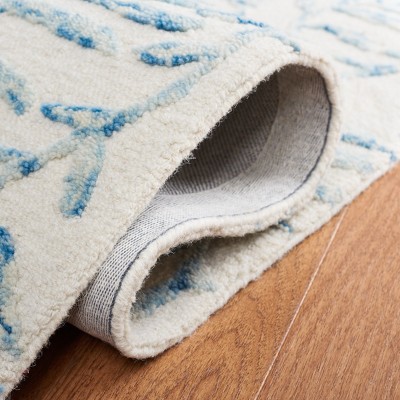 Ivory and Blue Floral Hand-Tufted Wool Area Rug 4' x 6'