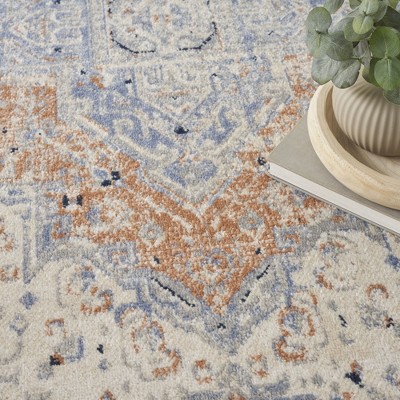 Beige Blue Rectangular 5' x 7' Synthetic Outdoor Rug